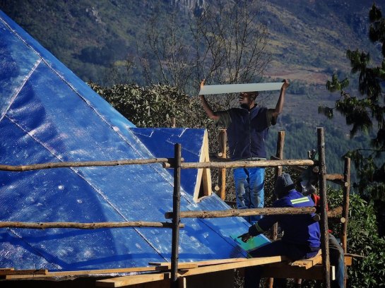 Edmore bringing up the roofing sheets