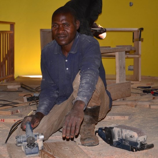 Mr Willard making shelving