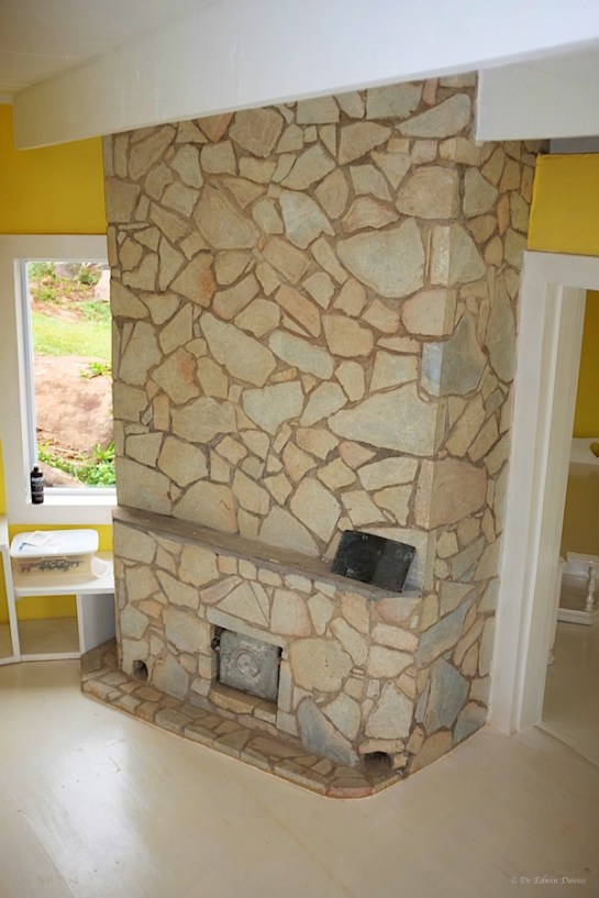 our masonry stove - faced in soap stone
