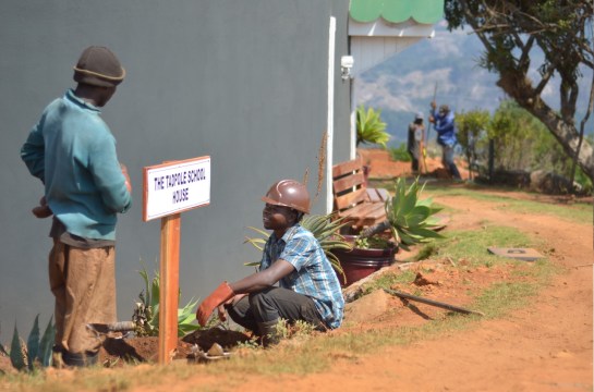 George & Tendai with Didymus & Artwell working on the 'car park' sign