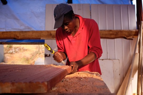 Didymus carving the doorstep