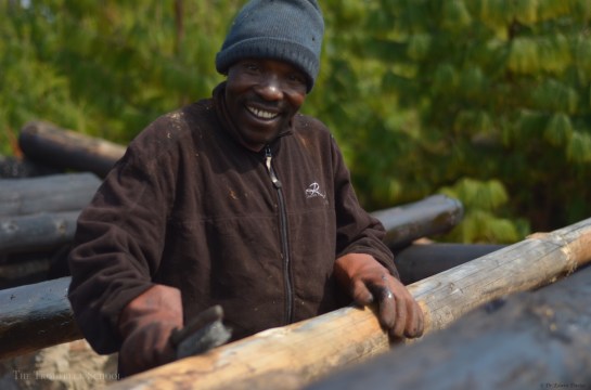 Dr Udhogo treating poles